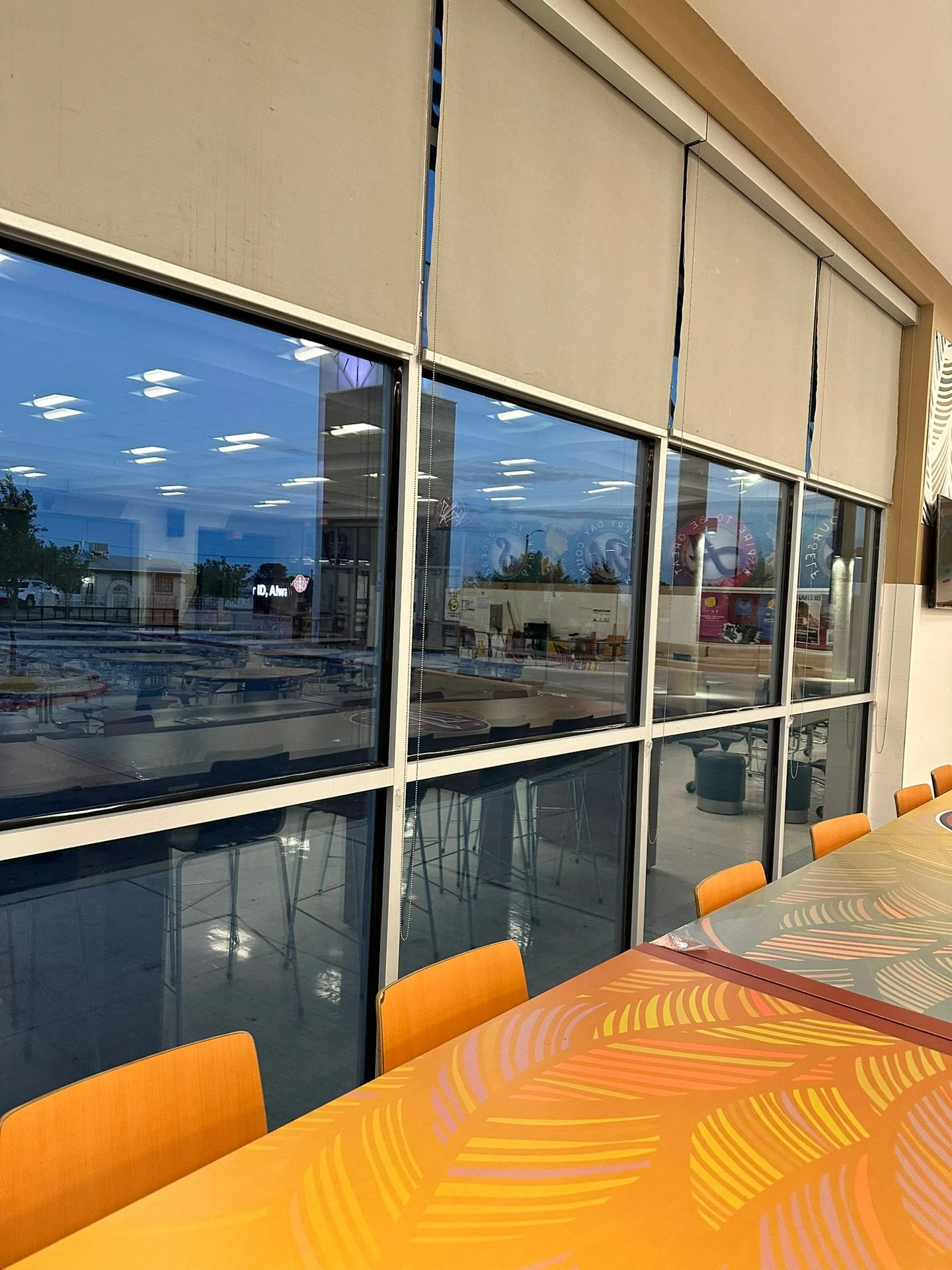 School cafeteria glass wall finished with safety and security window film