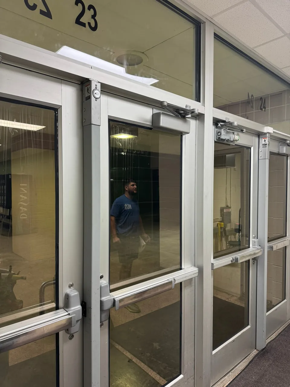 School entry doors and sidelites hardened with clear safety and security window film