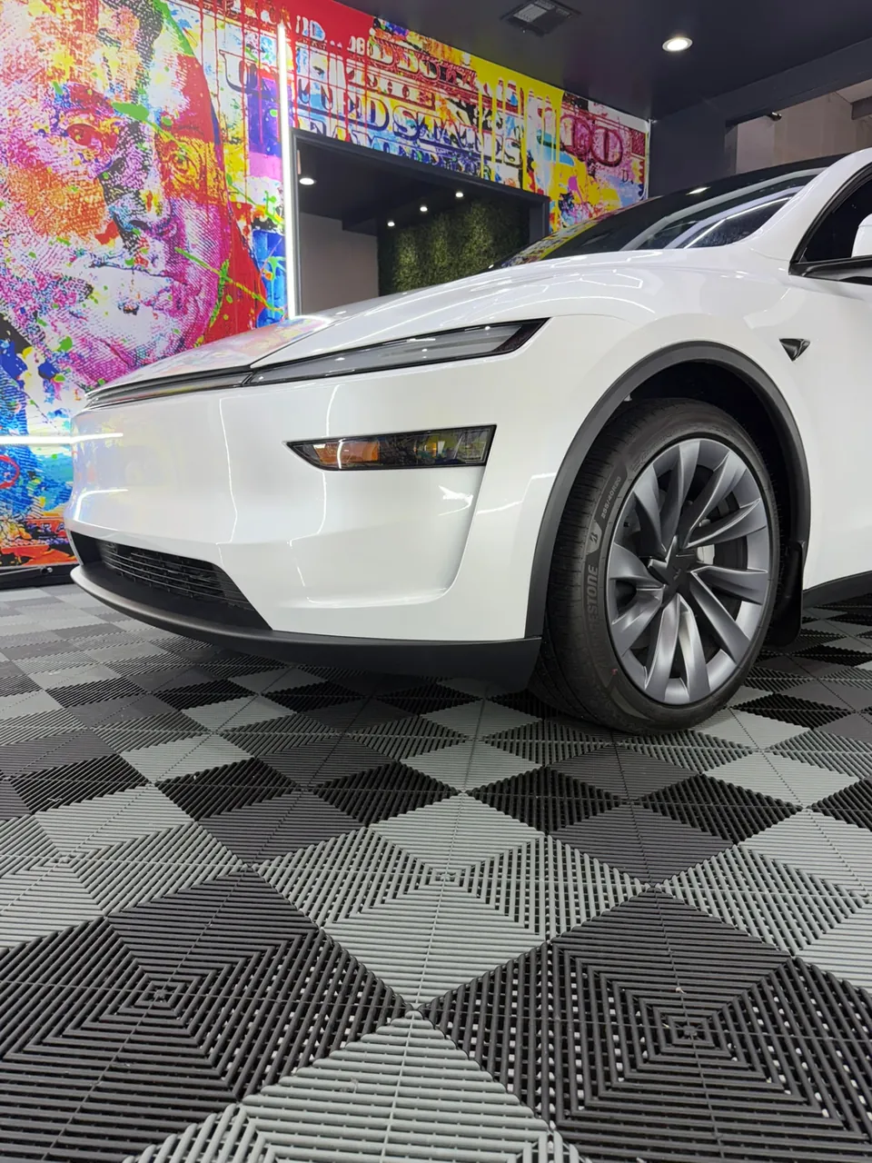 White Tesla Model Y with paint protection film at LeWolf in Magnolia, TX